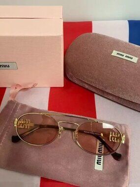 Miu Miu Gold Sunglasses with Amber Lenses